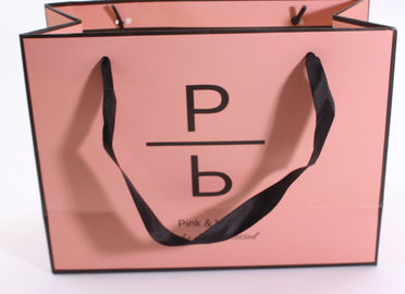 Bolsas de papel del rosa exacto de la impresión, bolsos de compras de lujo del boutique proveedor