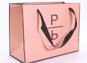Bolsas de papel del rosa exacto de la impresión, bolsos de compras de lujo del boutique proveedor