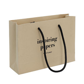 Material durable de papel impreso aduana biodegradable del papel de Kraft de los bolsos de compras proveedor
