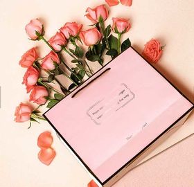 El color rosado personalizó el ODM/al OEM populares de papel de los bolsos de compras disponibles proveedor