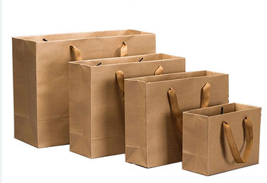 Alta resistencia de rasgón amistosa impresa de Eco de las bolsas de papel de Kraft de la durabilidad aduana alta proveedor