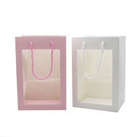 Bolsos de empaquetado del regalo de lujo del lazo, bolsa de papel de la cartulina con la ventana transparente proveedor