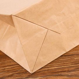 Cuerda plana respetuosa del medio ambiente impresa aduana de la mano de las bolsas de papel de Kraft proveedor