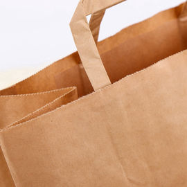 Cuerda plana respetuosa del medio ambiente impresa aduana de la mano de las bolsas de papel de Kraft proveedor