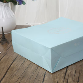 Azul claro/rosa personalizó el material blanco de papel del papel de los bolsos 150gsm Kraft del regalo proveedor