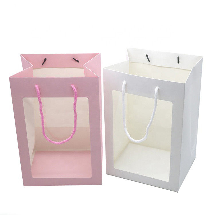 Bolsos de empaquetado del regalo de lujo del lazo, bolsa de papel de la cartulina con la ventana transparente proveedor